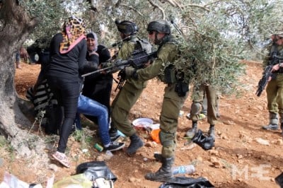 palestinian activist attacked by israeli soldiers