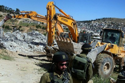 israeli-soldiers-gaurding-israeli-bulldozer-after-it-demolished-a-palestinian-home-in-al-aroub-refugee-camp-near-hebron