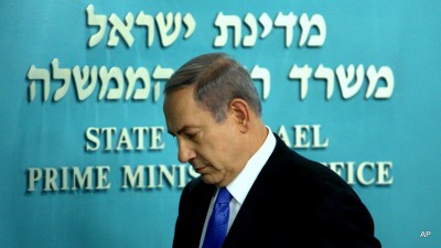 Israeli Prime Minister Benjamin Netanyahu walks out following a press conference at his Jerusalem office on Tuesday, July 14, 2015. The nuclear deal with Iran could strike a heavy personal blow to Netanyahu, leaving him at odds with the international community and with few options for scuttling an agreement he has spent years trying to prevent. (AP Photo/Oren Ben Hakoon)