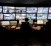 Municipal police officers watch screens in the video surveillance control room of the municipal police supervision centre in Nice