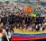 Opposition demonstrators take part in a women's rally against Nicolas Maduro's government in San Cristobal
