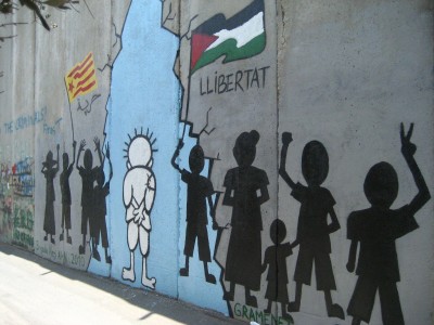 A graffiti of Naji al-Ali's Handala on the West Bank separation wall