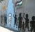 A graffiti of Naji al-Ali's Handala on the West Bank separation wall