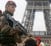 French soldiers at the Eiffel Tower after the Paris shootings. Photo: Reuters